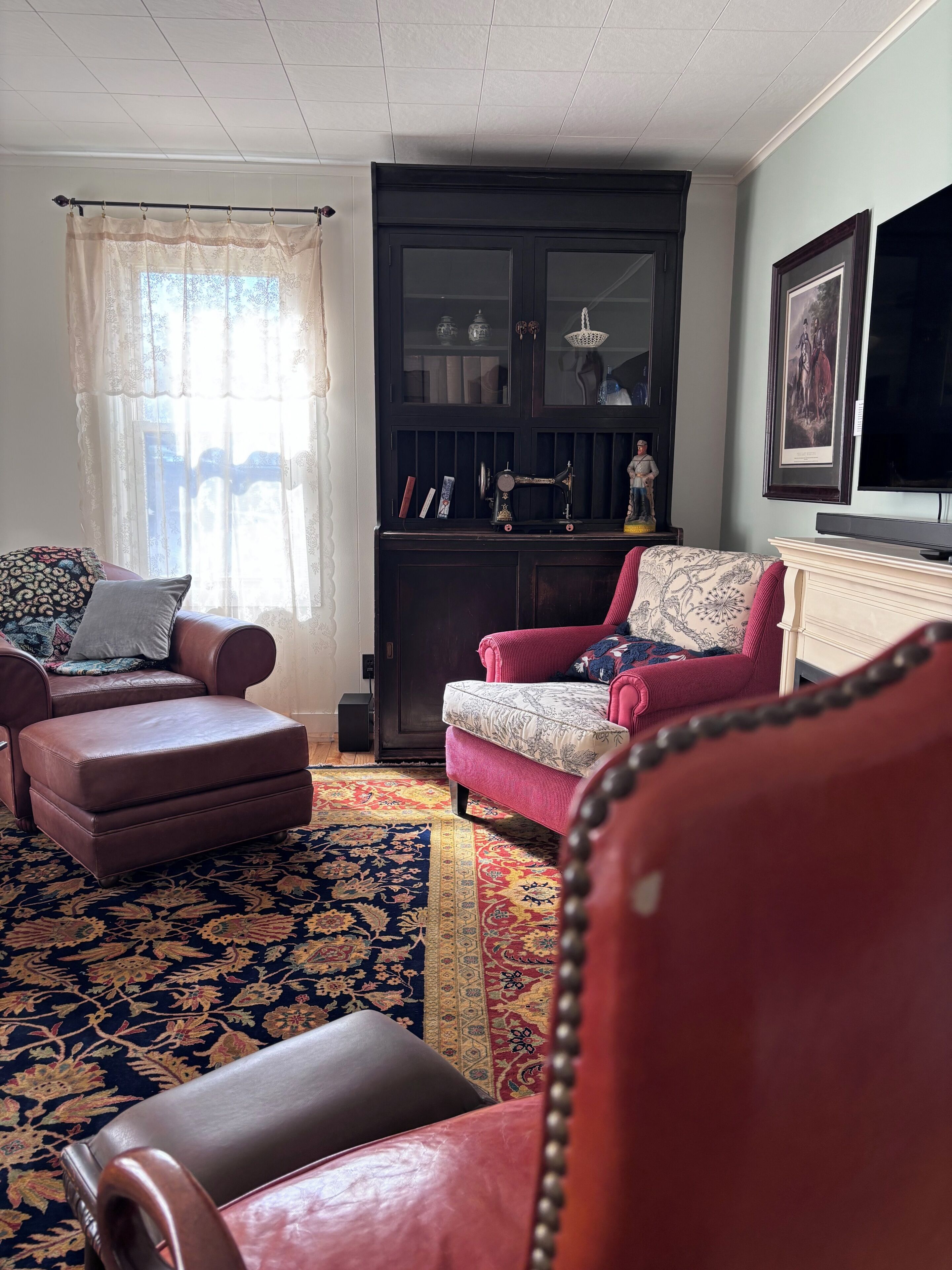 Smart TV, fireplace, books