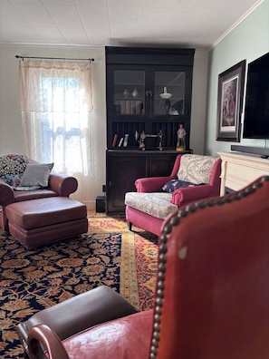 Smart TV, fireplace, books