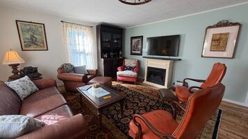Smart TV, fireplace, books