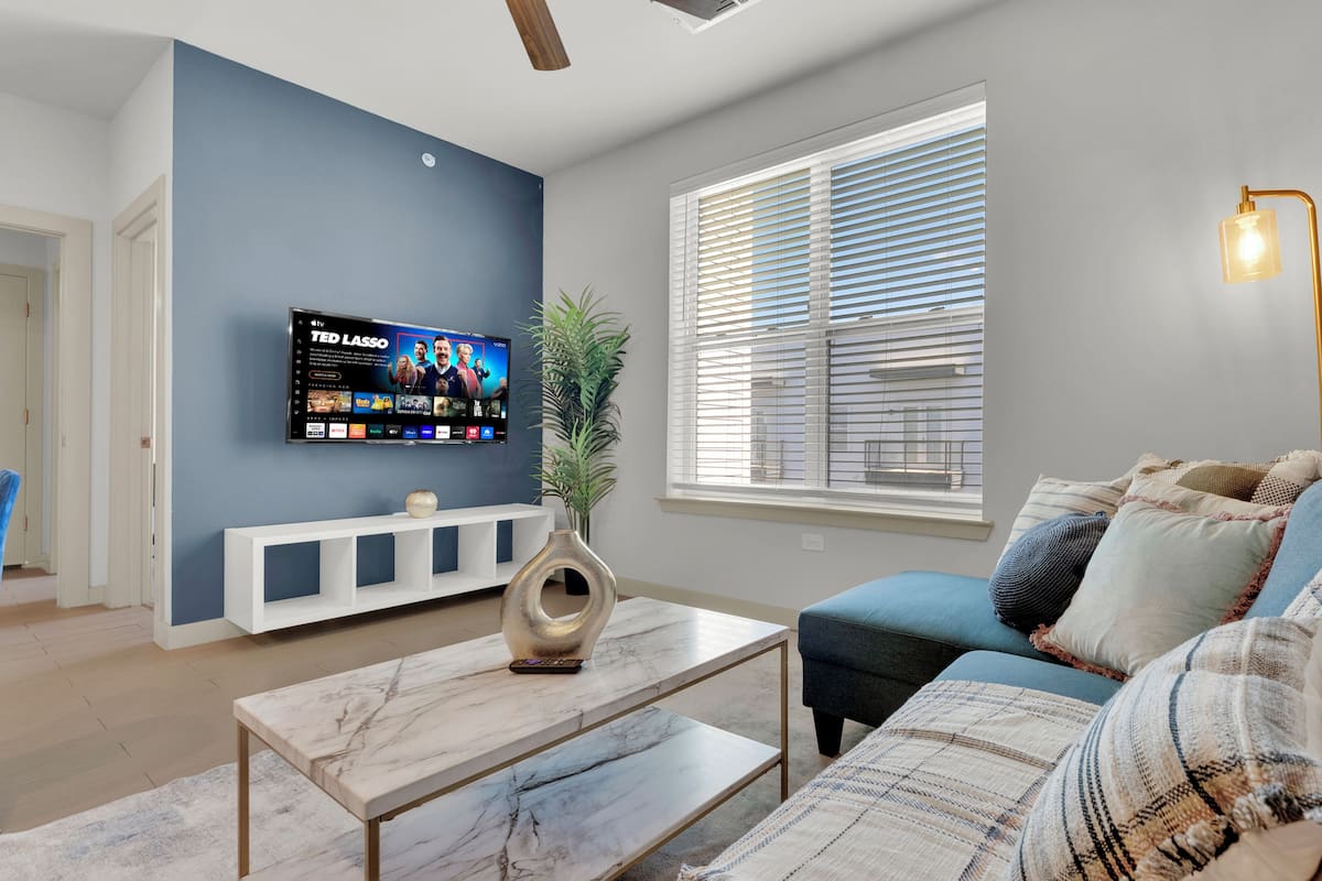 Apartment, 1 Bedroom | Living area | 55-inch Smart TV with digital channels, streaming services