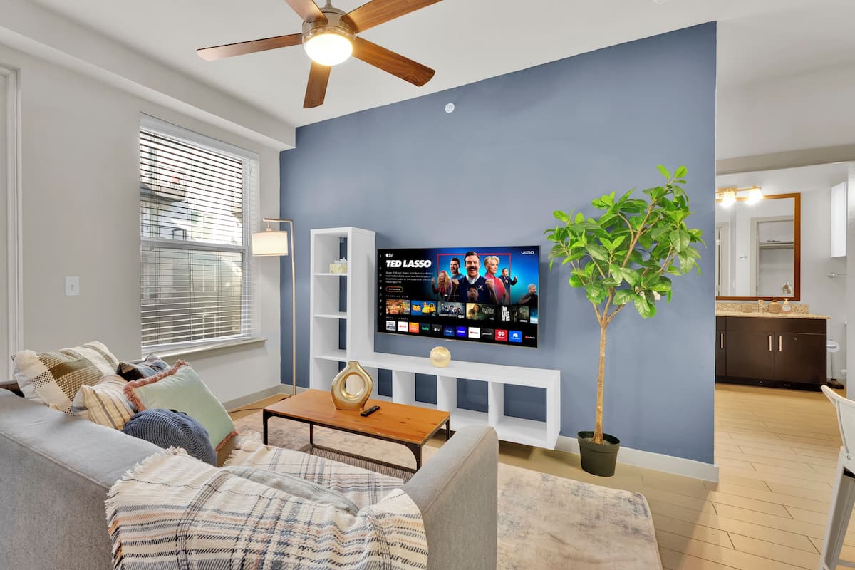 Apartment, 2 Bedrooms | Living area | 55-inch Smart TV with digital channels, streaming services
