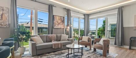 Appartement, 3 chambres | Aire de séjour