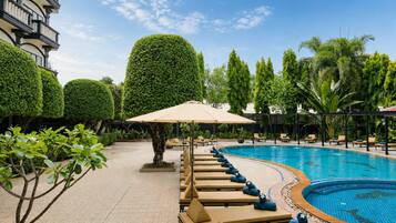 Outdoor pool, open 9:00 AM to 9:00 PM, pool umbrellas, sun loungers