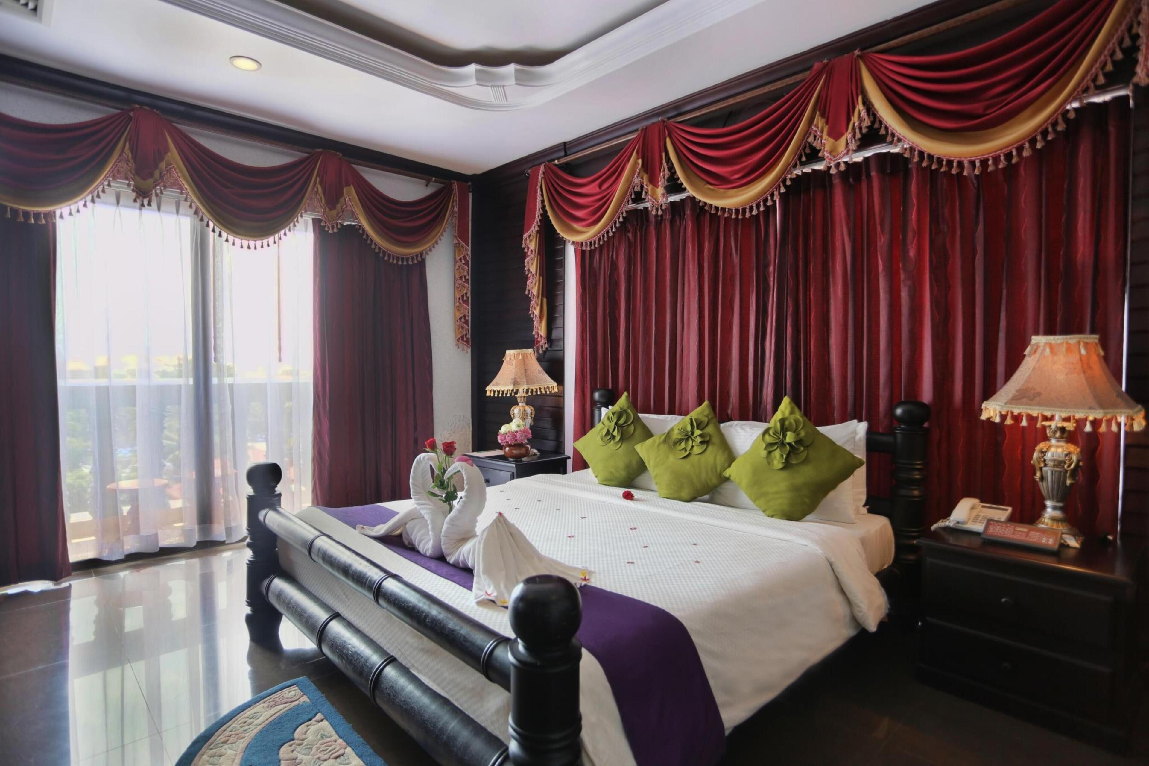 Executive Suite, Balcony, Pool View | In-room safe, individually decorated, individually furnished, desk