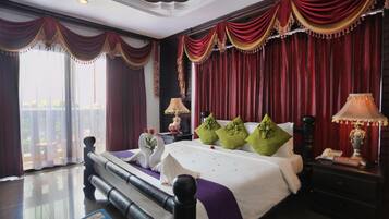 Executive Suite, Balcony, Pool View | In-room safe, individually decorated, individually furnished, desk