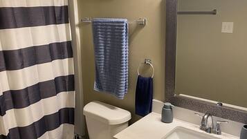 Hair dryer, towels, soap, toilet paper