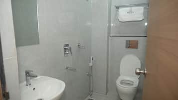 Shower, towels, soap, shampoo