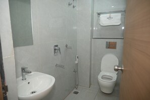 Shower, towels, soap, shampoo - The Aspire Hotel Guwahati (Guwahati)