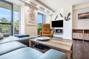 Télévision, lecteur de DVD, chaîne hi-fi