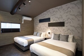 A hotel room with two beds, a window with blinds, a wall-mounted air conditioner, and a decorative wall panel. - JAPAVISTA Asahi (Tengachaya, Nishinari Ward)