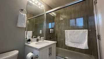 Hair dryer, towels, soap, toilet paper