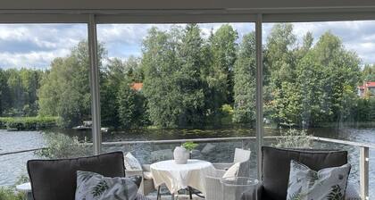 Lovely holiday home next to a lake
