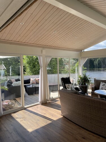 Lovely holiday home next to a lake
