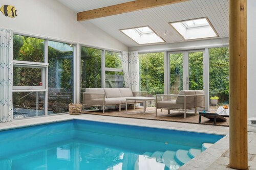 Cozy holiday home with pool by the beach