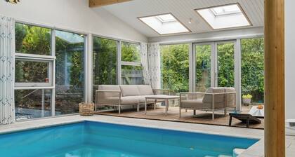 Cozy holiday home with pool by the beach