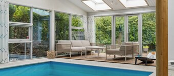 Cozy holiday home with pool by the beach