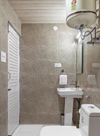 Shower, slippers, towels, soap