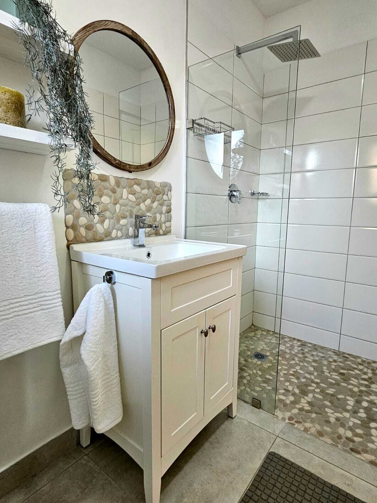 Shower, towels, toilet paper