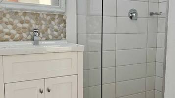 Shower, towels, toilet paper
