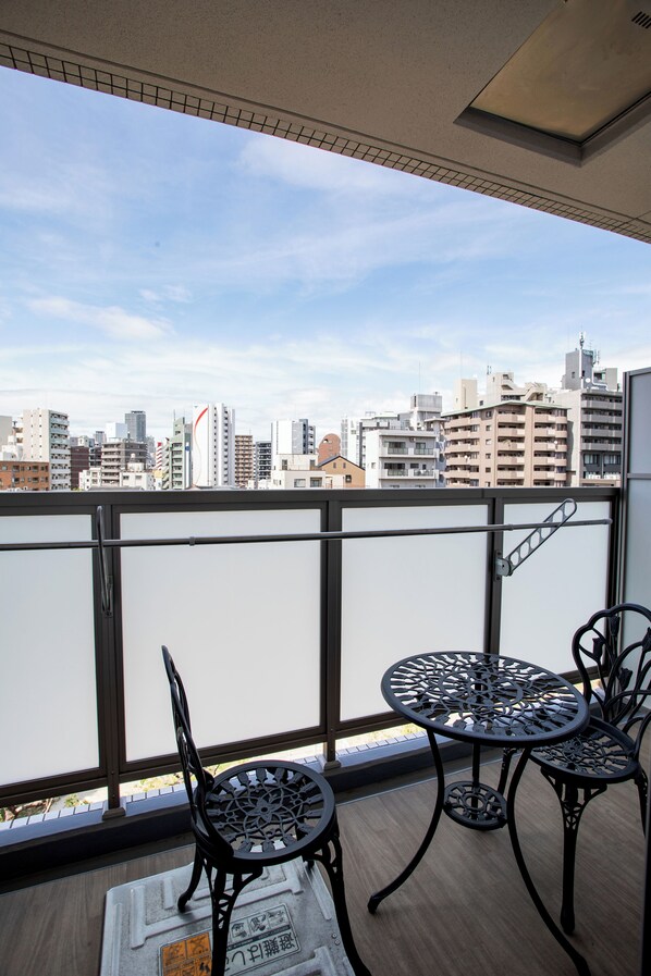 Comfort Apartment, Balcony, City View | Outdoor dining - Star house (Naniwa Ward)