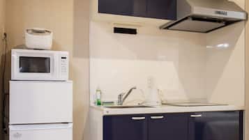 Apartamento conforto, sacada, vista para a cidade | Cozinha privada