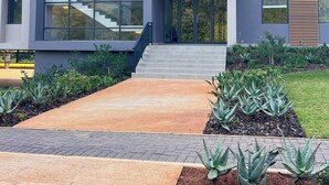 A modern building with a sign reading 'Boulevard Edge Zimbabwe Lakes.' - Zimbali Lakes Boulevard Edge 214 (Ballito)