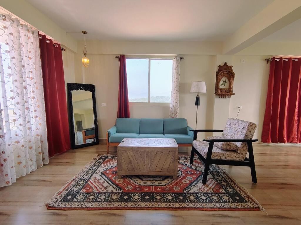 Chambre Double Deluxe, balcon, vue mer | Coin séjour