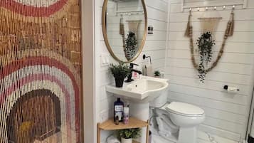 Hair dryer, towels, soap, toilet paper
