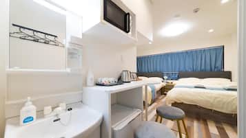 Hair dryer, slippers, towels, soap