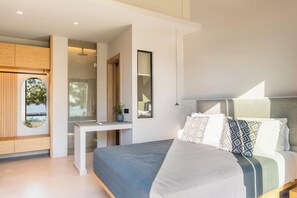 Ein modernes Schlafzimmer mit Bett, Nachttisch und Blick durch eine offene Tür.