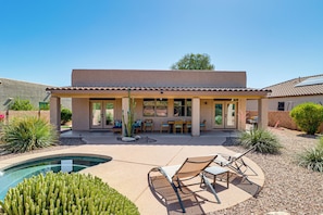 A house with a patio, a pool, and a cactus garden. - Saguaro Sanctuary: Tucson Home w/ Outdoor Oasis (Tucson)