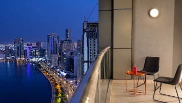 Shared terrace seating with lake views; separate from private room balconies