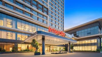 A modern hotel with a prominent 'Intercity Hotel' sign.