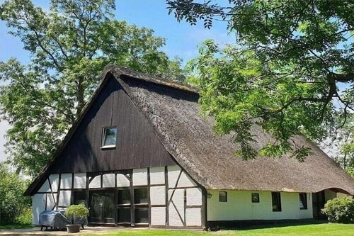 Exclusive thatched cottage with wellness facilities