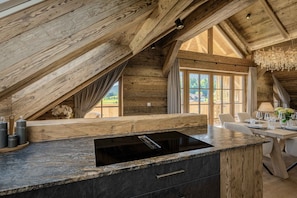 Private kitchen - Luxury Apartment at Lake Wolfgang | with Hot Tub for 4 Guests | panoramaNEST (Strobl)