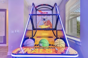 Challenge your friends to a friendly game of arcade basketball—the perfect way to bring out your competitive side and make lasting vacation memories. - Reunion Resort: 8-Bed Villa, Arcade, Theater, Pool (Kissimmee)