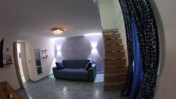 Apartment (1 Bedroom) | Living area | TV
