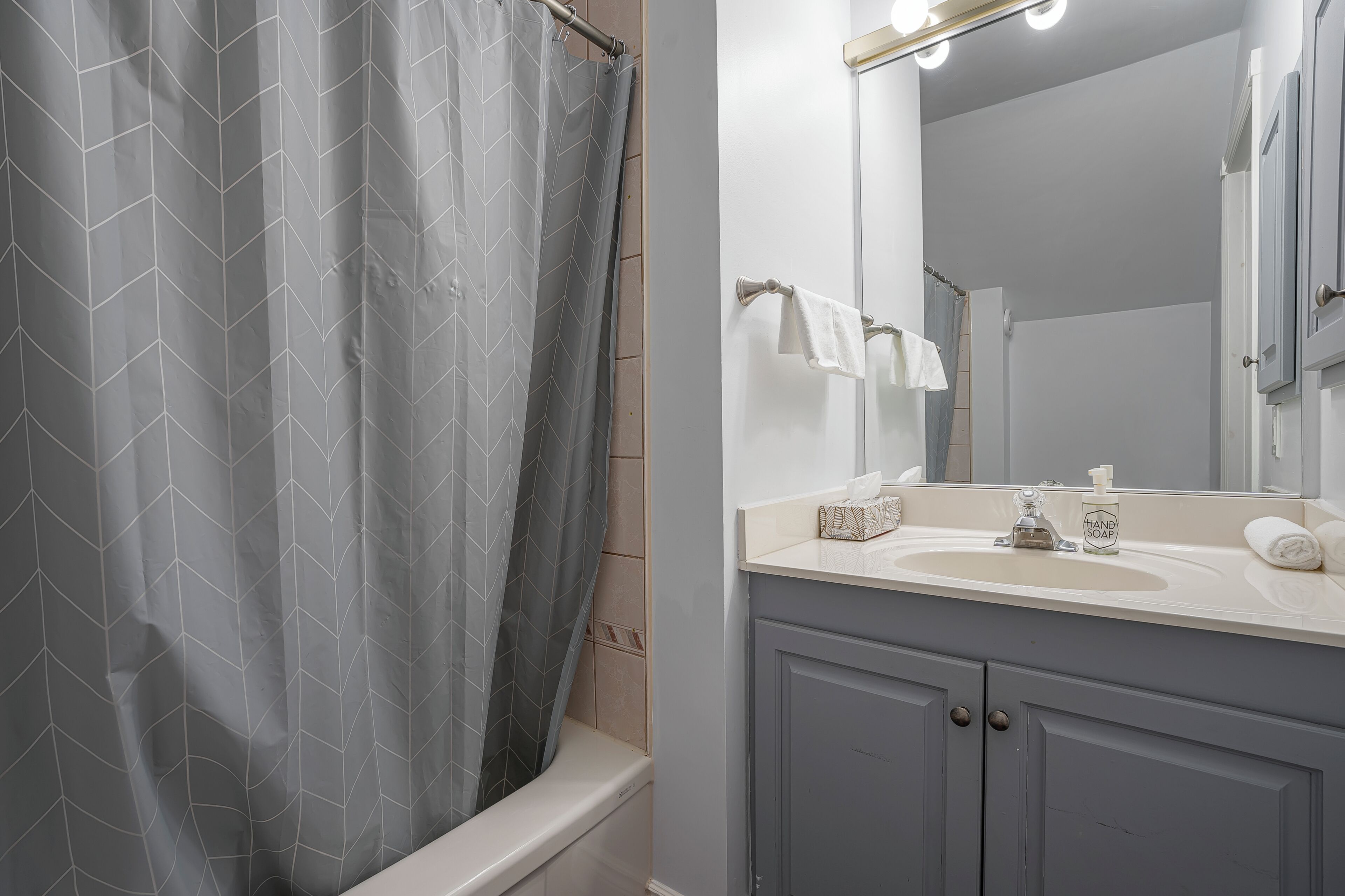 Jetted tub, hair dryer, towels, soap