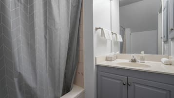 Jetted tub, hair dryer, towels, soap