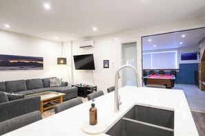 Games room - A spacious condo with all the amenities for a family getaway or ski trip with friends including private hot tub, pool table, mini bar and more! (Revelstoke)
