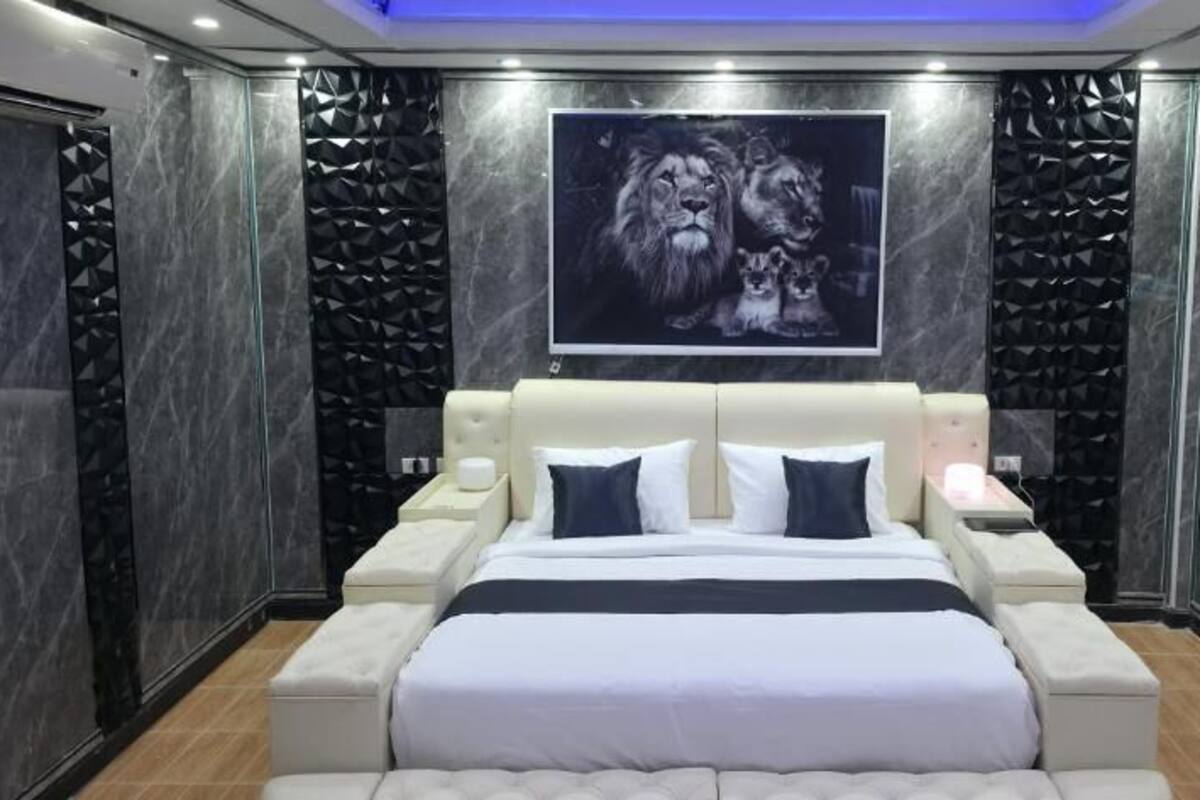 Luxury Studio Suite, Poolside | In-room safe, blackout drapes, iron/ironing board, free WiFi
