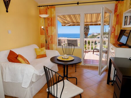 Living area. Apartment 'Casa Bena' with Large Balcony, Beautiful Views, Sea View, and Free Wi-Fi