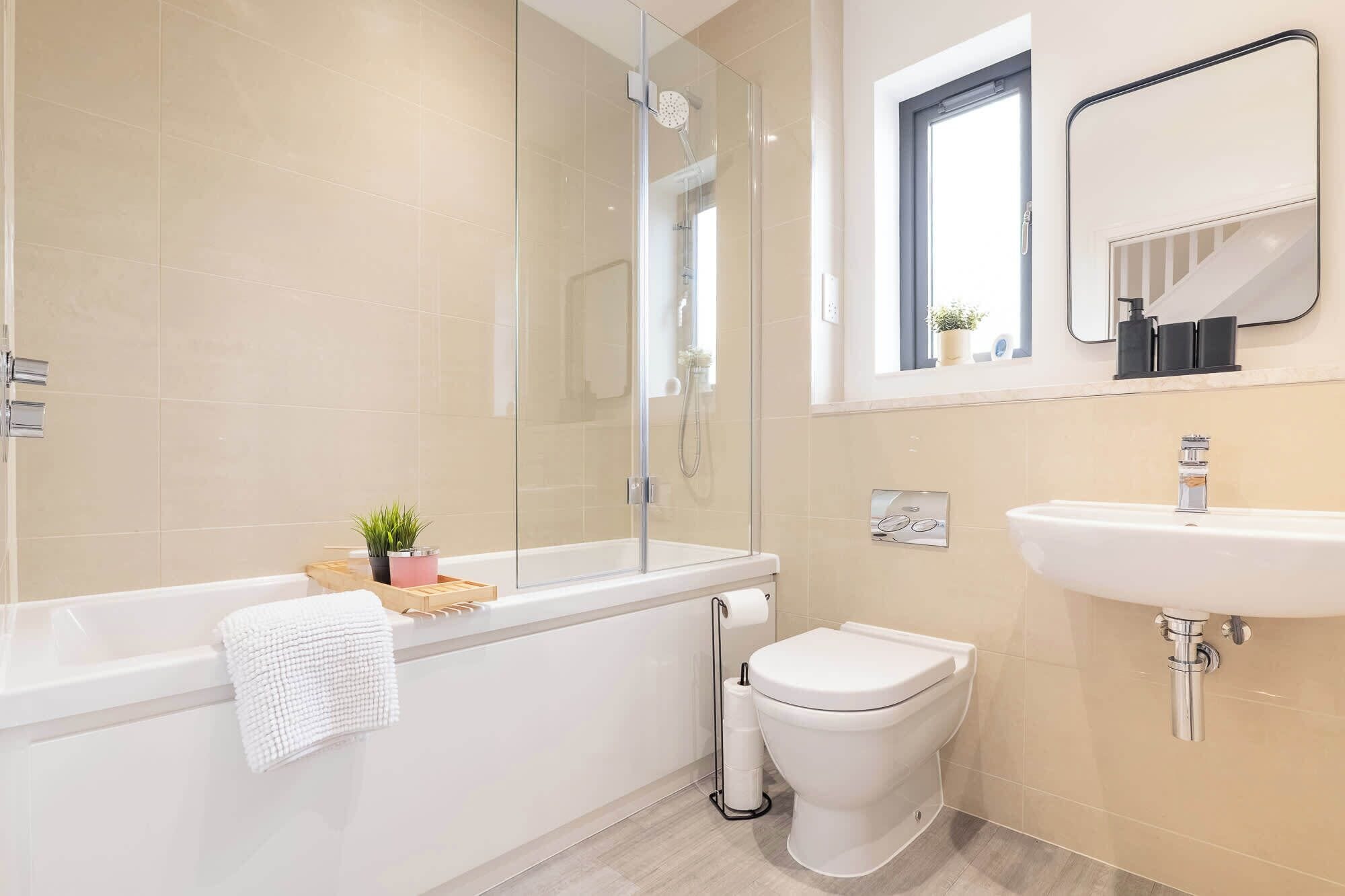 Shower, hair dryer, towels, shampoo