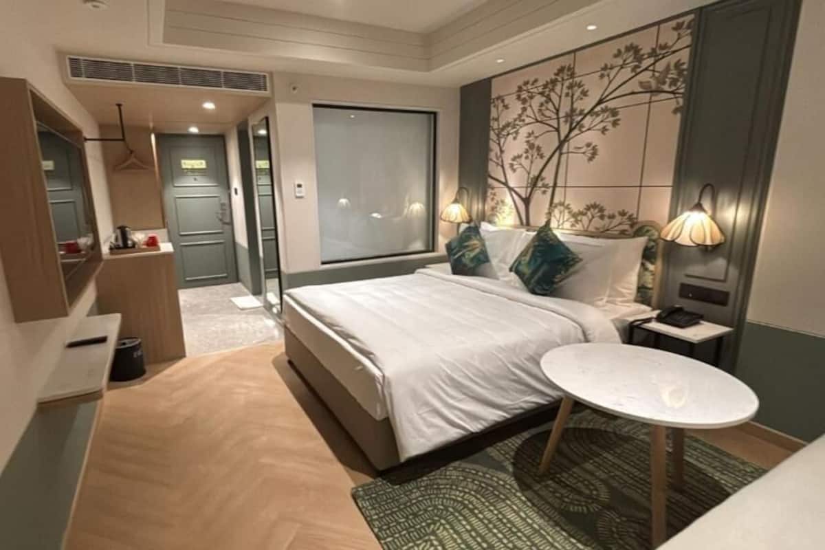 Signature Suite | Fer et planche Ă repasser, accĂšs au Wi-Fi (inclus)