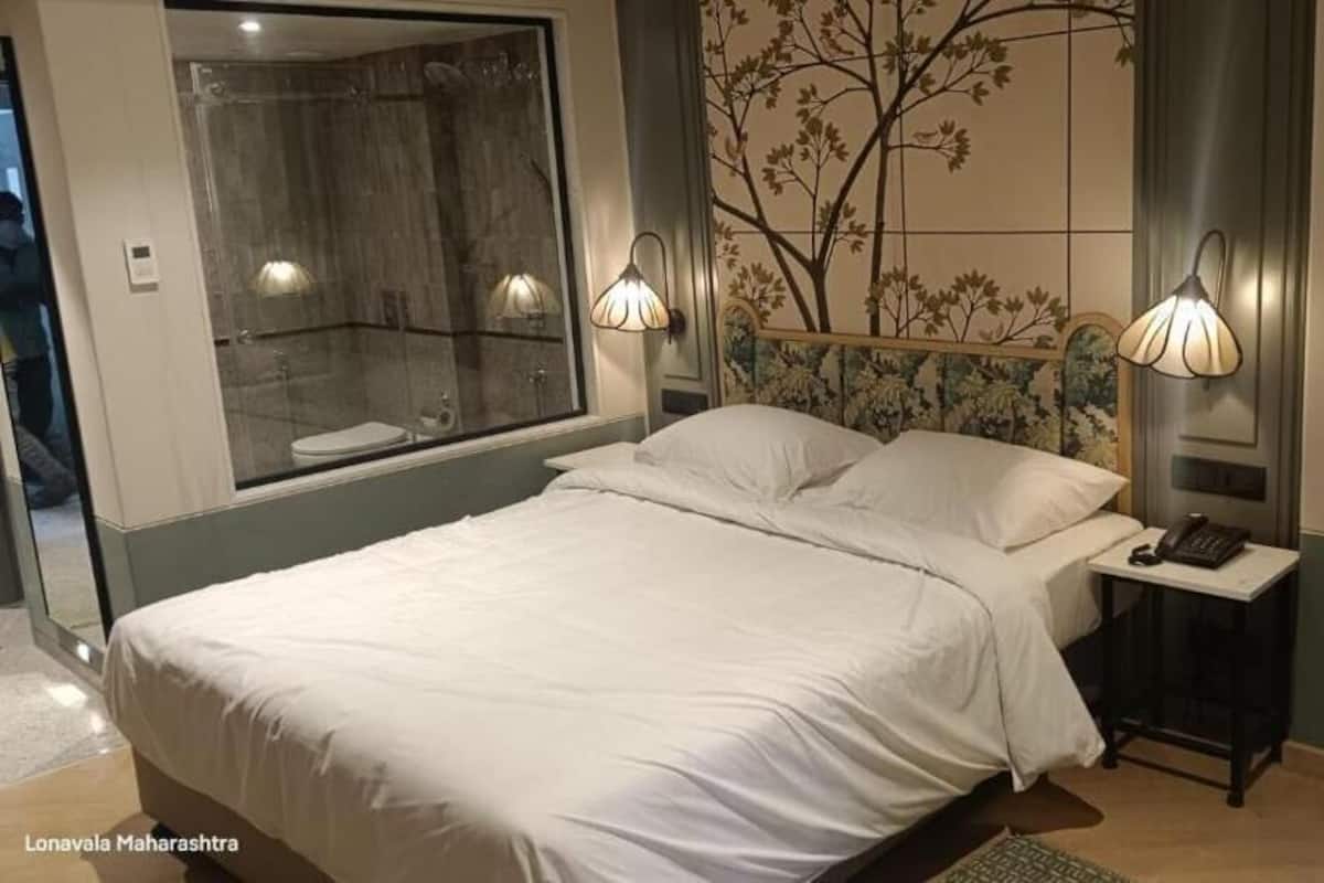 Royal Palm Queen | Fer et planche Ă repasser, accĂšs au Wi-Fi (inclus)