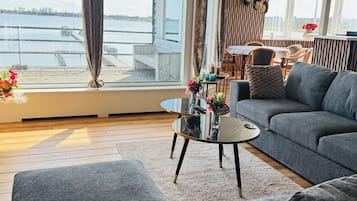Apartment, Balcony, Lake View | Living area