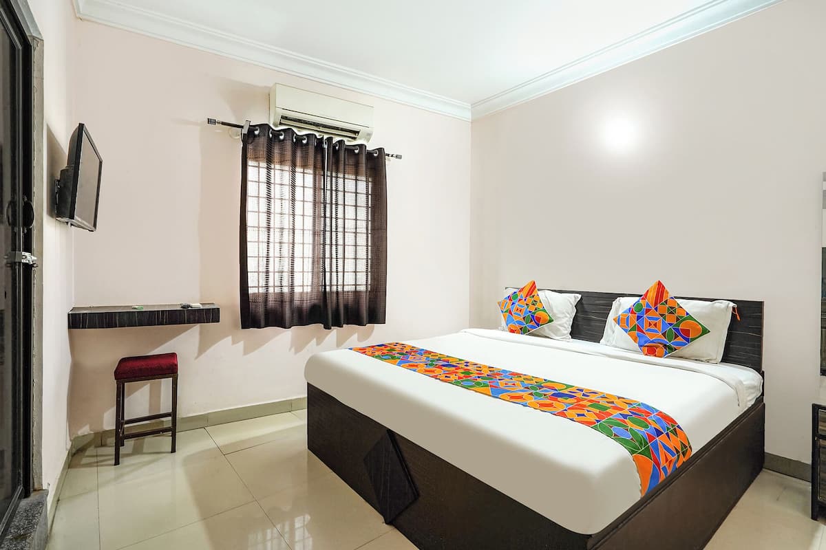 Habitación Deluxe | Sábanas de algodón egipcio, ropa de cama de alta calidad, caja fuerte