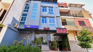 A multi-story building with a sign for 'FABHOTELS' and 'HOTEL BLUE DIAMOND' on the facade. - FabHotel Blue Diamond - Mansarovar , Jaipur (Jaipur)