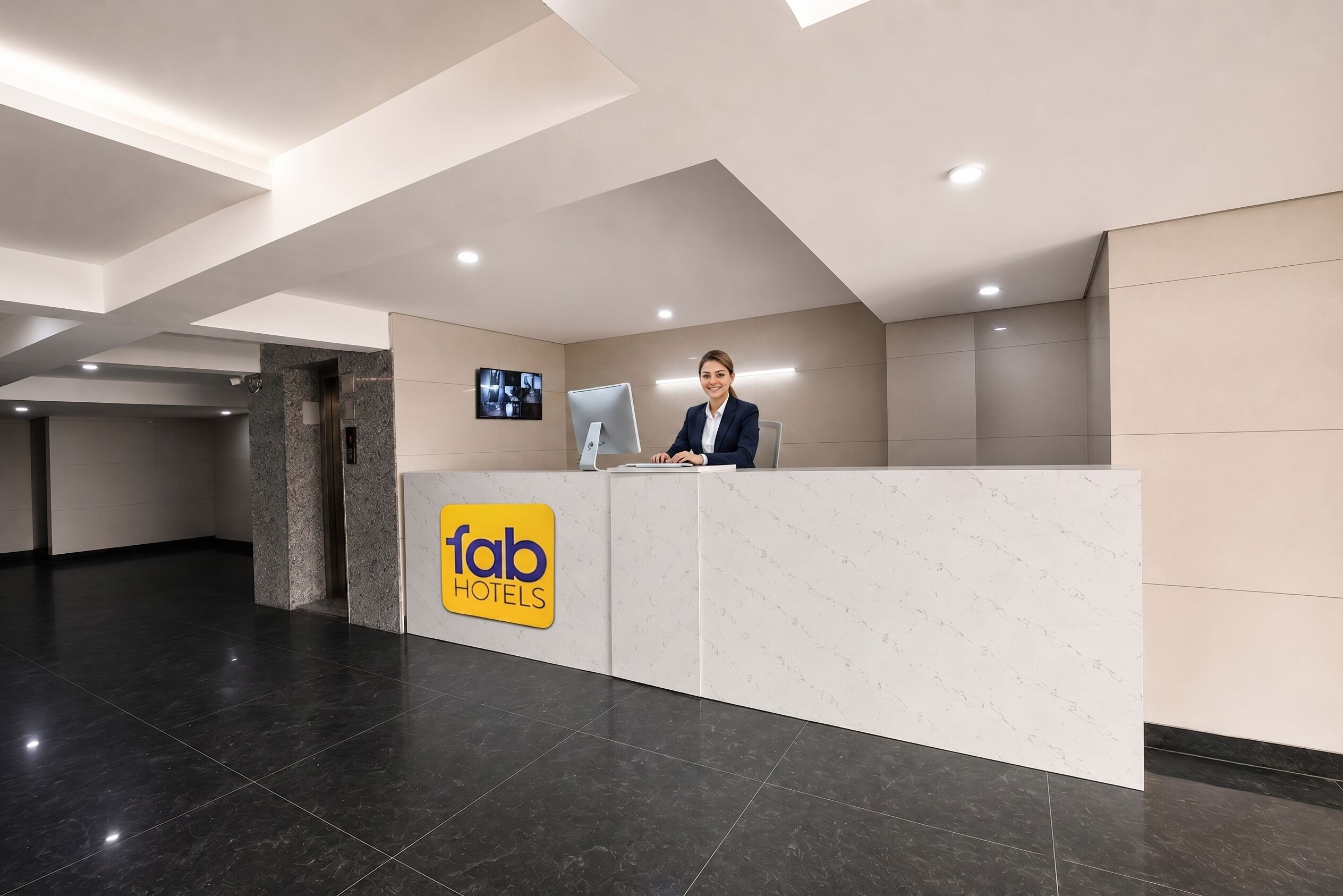 A hotel reception desk with a modern design, a digital screen, and a marble floor.