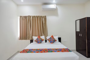 Premium kamer | Lakens van Egyptisch katoen, luxe beddengoed, een kluis op de kamer